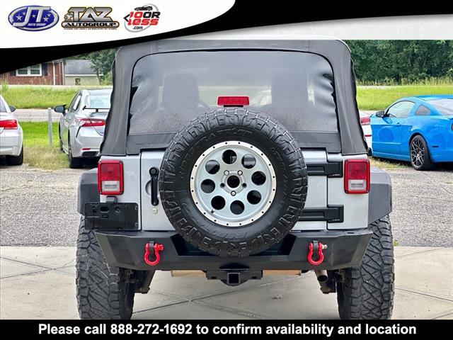 used 2014 Jeep Wrangler Unlimited car, priced at $15,709