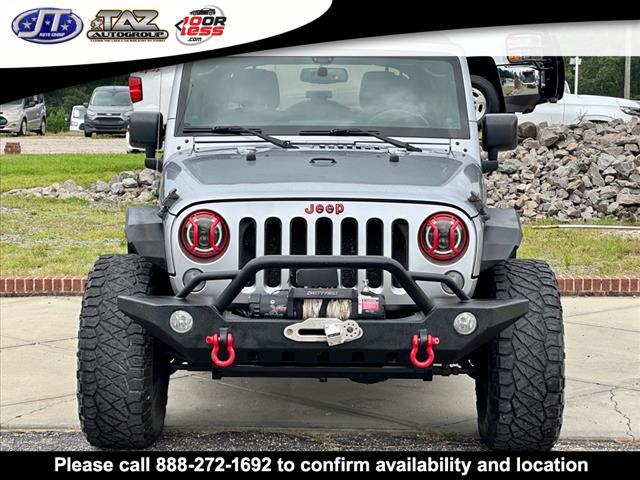 used 2014 Jeep Wrangler Unlimited car, priced at $15,709