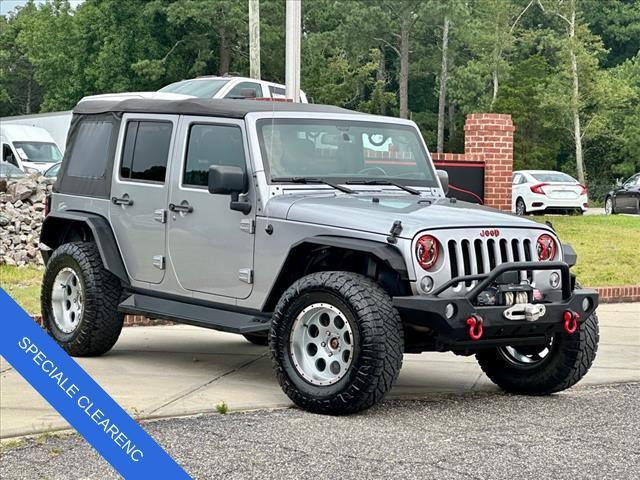 used 2014 Jeep Wrangler Unlimited car, priced at $14,112