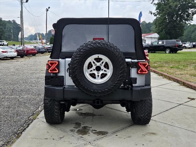 used 2015 Jeep Wrangler Unlimited car, priced at $15,920