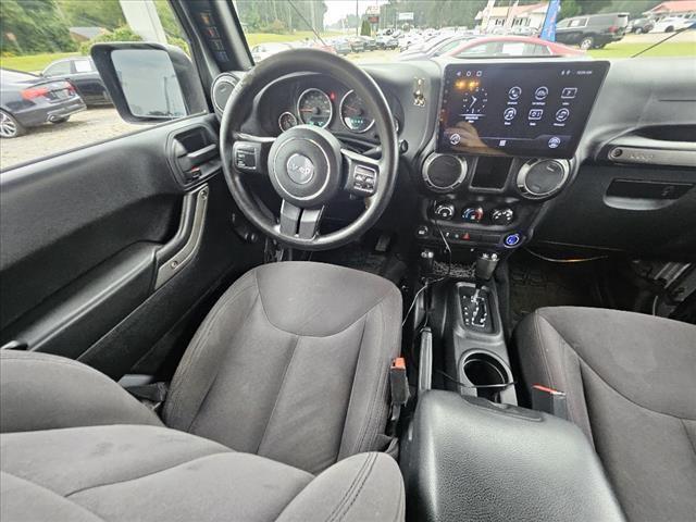 used 2015 Jeep Wrangler Unlimited car, priced at $15,920