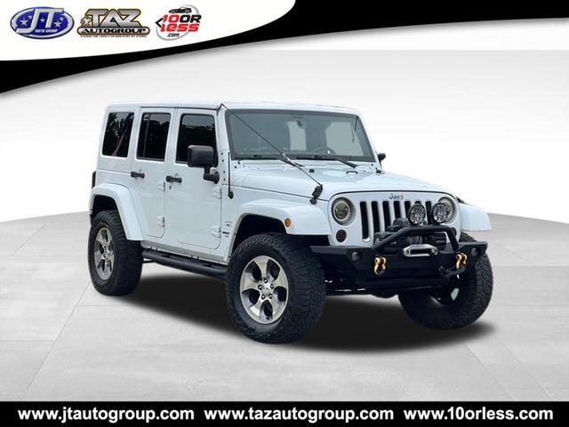 used 2016 Jeep Wrangler Unlimited car, priced at $22,928