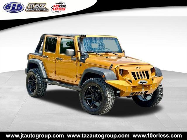 used 2014 Jeep Wrangler Unlimited car, priced at $18,493