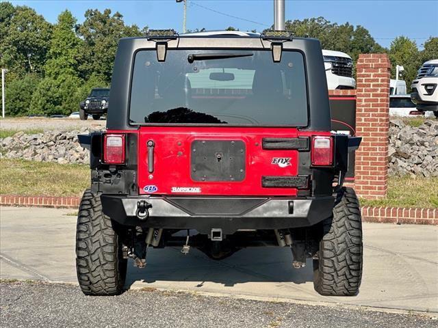 used 2015 Jeep Wrangler Unlimited car, priced at $23,533