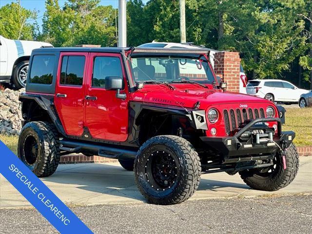 used 2015 Jeep Wrangler Unlimited car, priced at $23,533