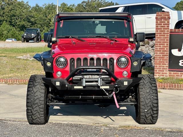 used 2015 Jeep Wrangler Unlimited car, priced at $23,533