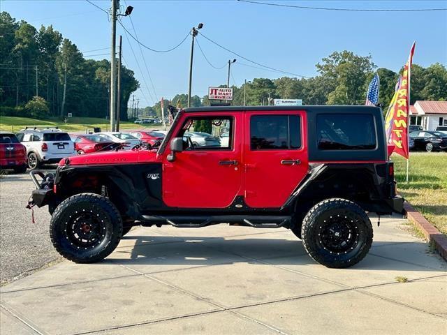 used 2015 Jeep Wrangler Unlimited car, priced at $23,533