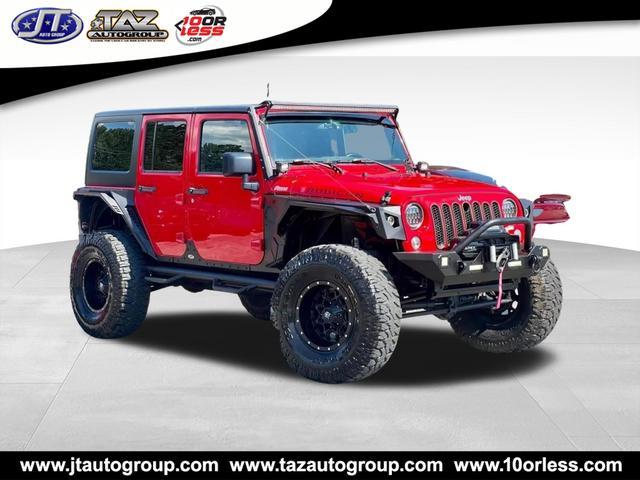 used 2015 Jeep Wrangler Unlimited car, priced at $24,366