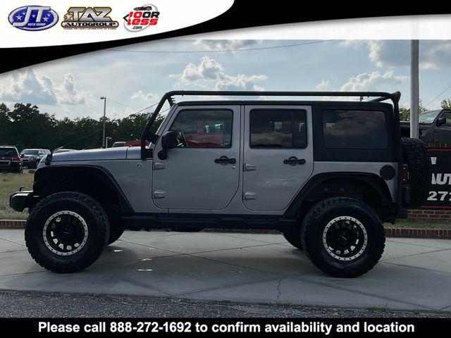used 2014 Jeep Wrangler Unlimited car, priced at $21,497