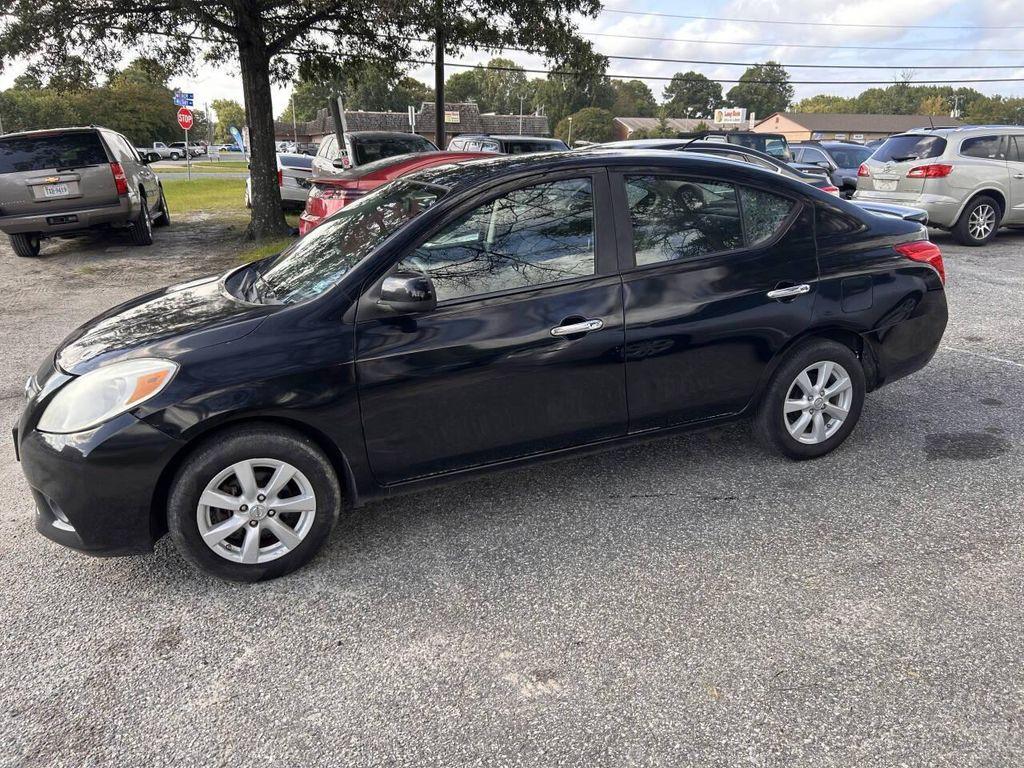 used 2013 Nissan Versa car, priced at $3,995