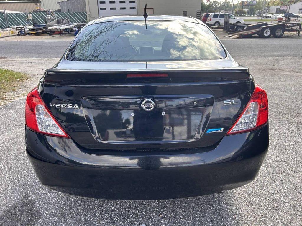 used 2013 Nissan Versa car, priced at $3,995