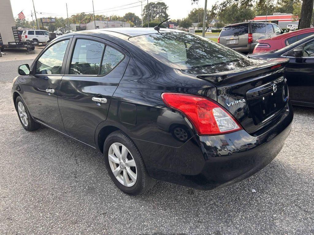 used 2013 Nissan Versa car, priced at $3,995
