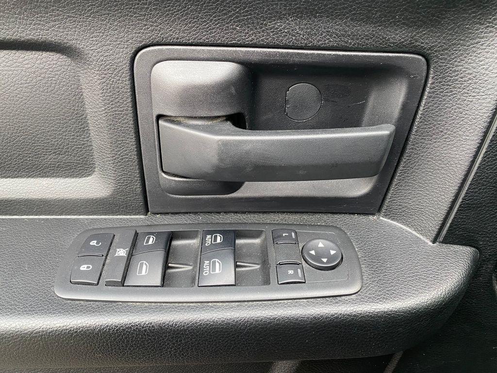 used 2018 Ram 1500 car, priced at $19,301