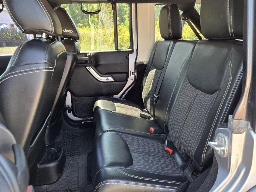 used 2013 Jeep Wrangler Unlimited car, priced at $17,950