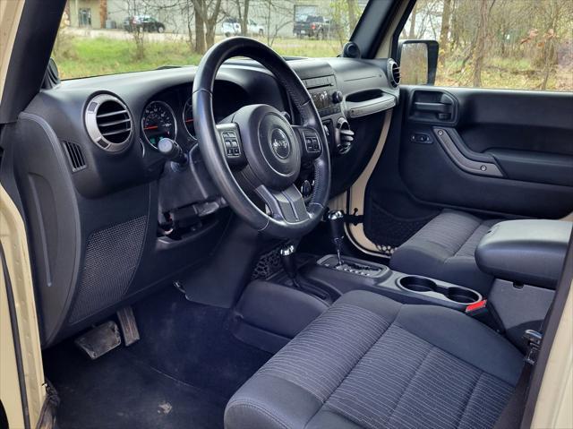 used 2011 Jeep Wrangler Unlimited car, priced at $13,950