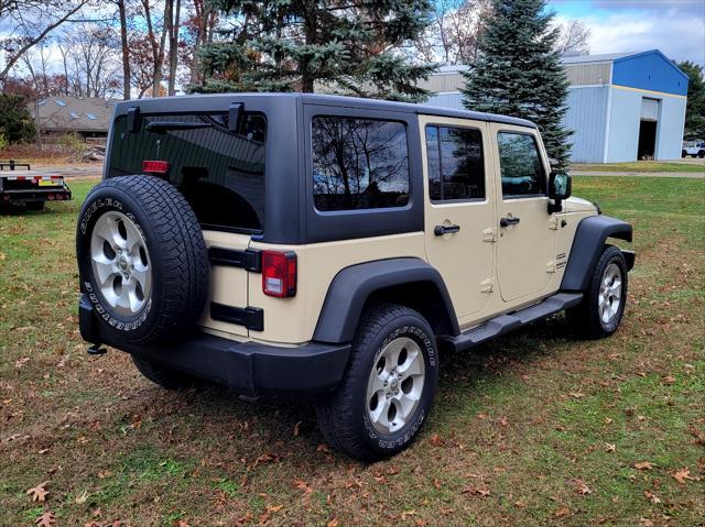 used 2011 Jeep Wrangler Unlimited car, priced at $13,950