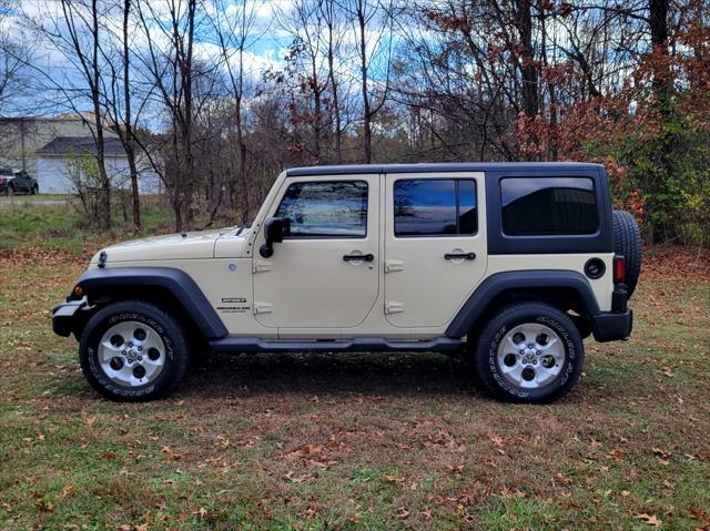 used 2011 Jeep Wrangler Unlimited car, priced at $13,950