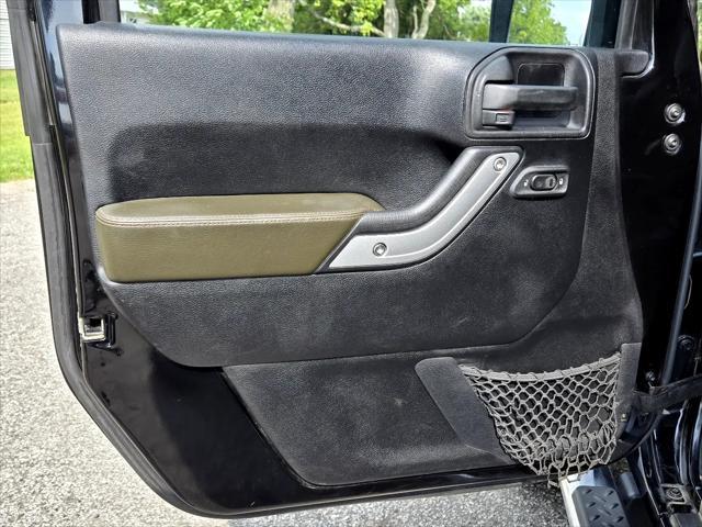 used 2011 Jeep Wrangler Unlimited car, priced at $12,950