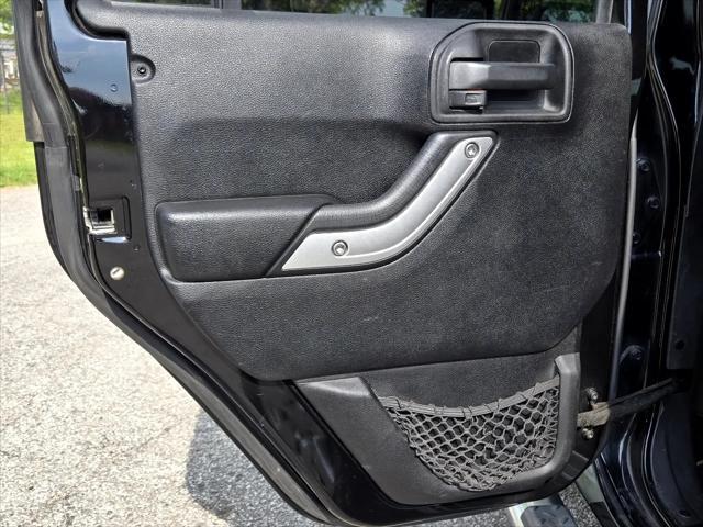 used 2011 Jeep Wrangler Unlimited car, priced at $12,950