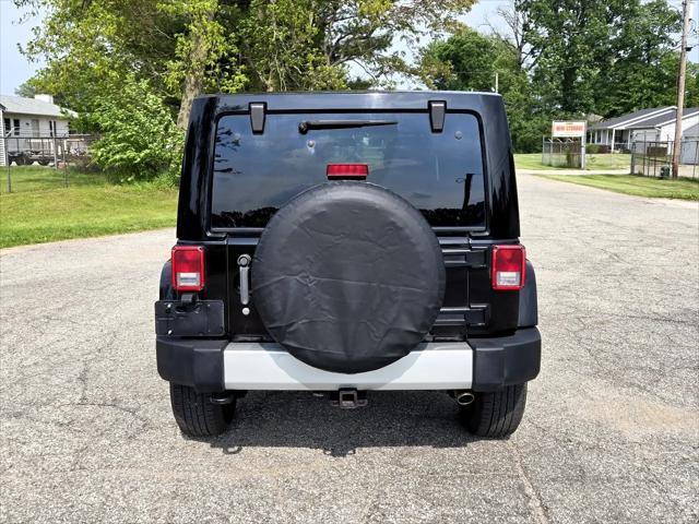 used 2011 Jeep Wrangler Unlimited car, priced at $12,950
