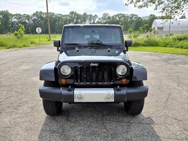 used 2011 Jeep Wrangler Unlimited car, priced at $12,950