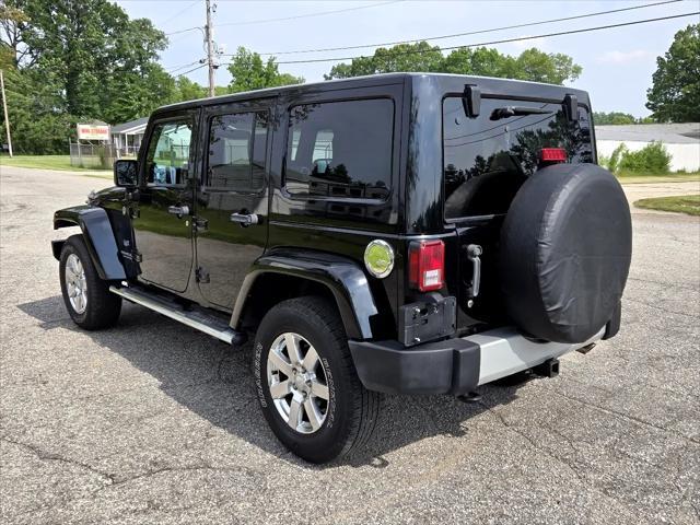 used 2011 Jeep Wrangler Unlimited car, priced at $12,950