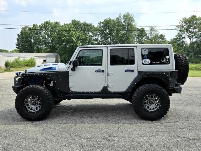used 2016 Jeep Wrangler Unlimited car, priced at $25,950