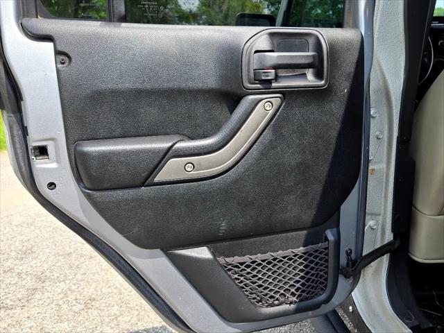 used 2016 Jeep Wrangler Unlimited car, priced at $25,950
