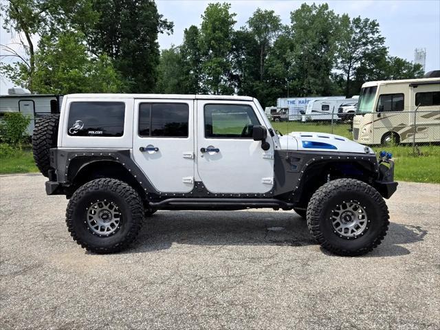 used 2016 Jeep Wrangler Unlimited car, priced at $25,950