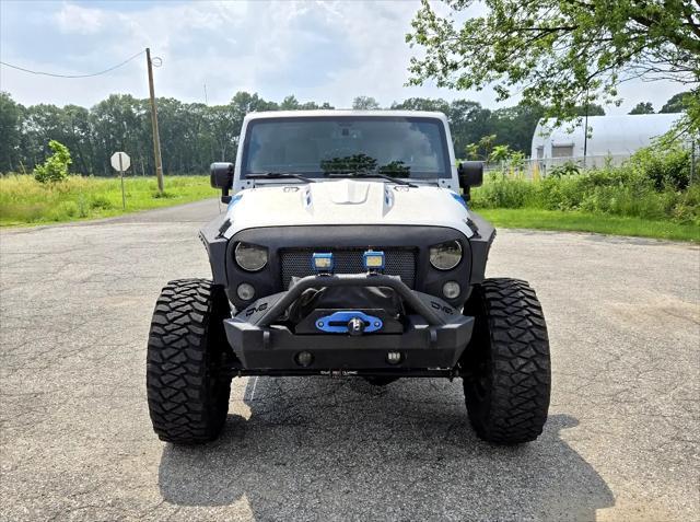 used 2016 Jeep Wrangler Unlimited car, priced at $25,950
