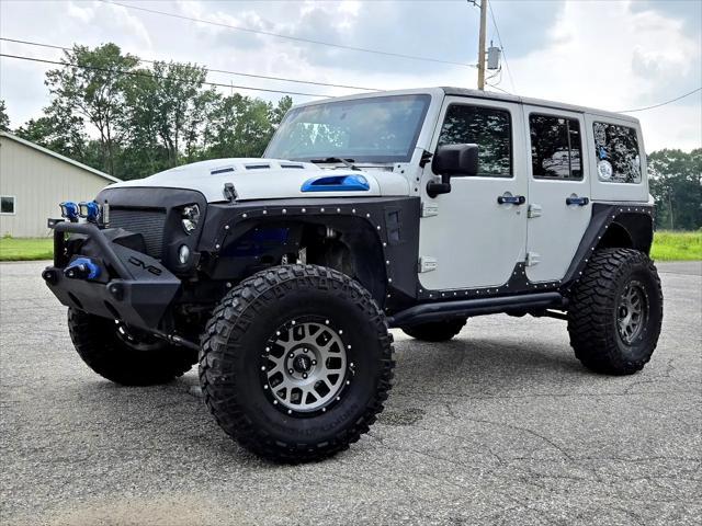 used 2016 Jeep Wrangler Unlimited car, priced at $25,950