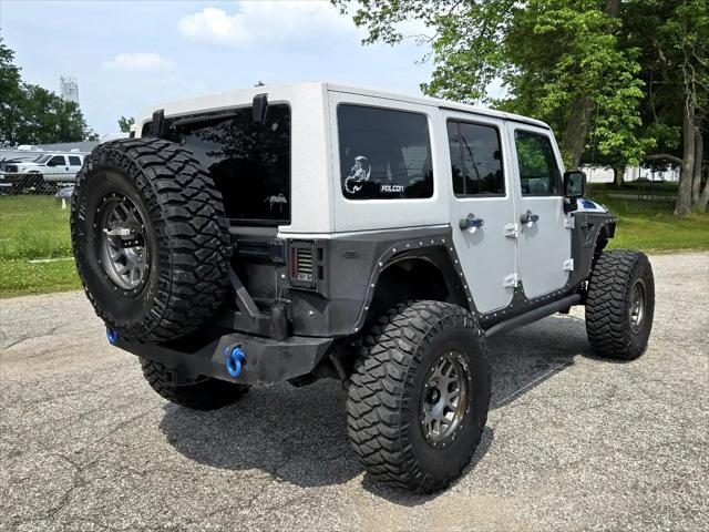 used 2016 Jeep Wrangler Unlimited car, priced at $25,950