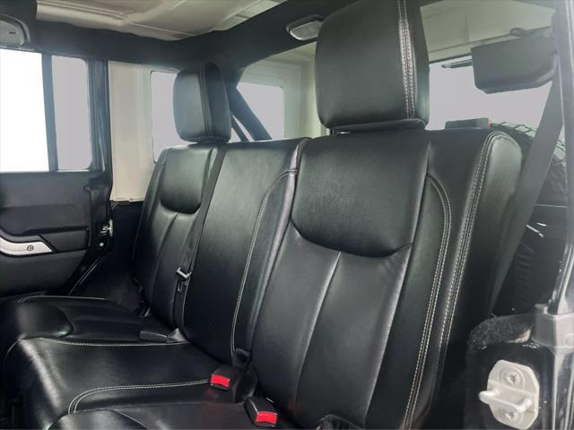 used 2015 Jeep Wrangler Unlimited car, priced at $24,232
