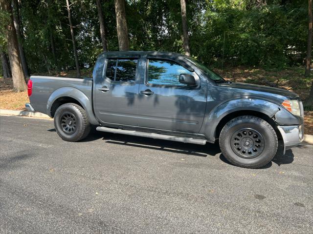 used 2010 Nissan Frontier car, priced at $9,800