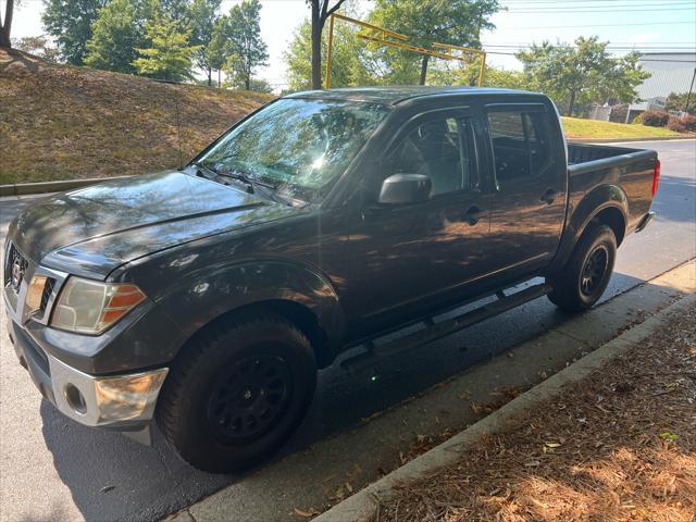 used 2010 Nissan Frontier car, priced at $9,800