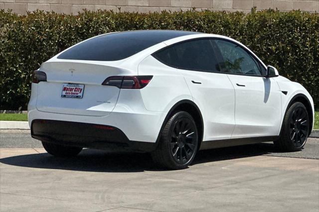 used 2023 Tesla Model Y car, priced at $34,010