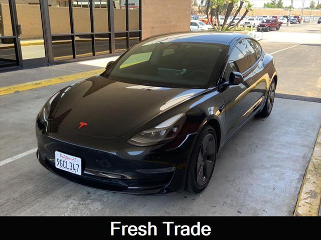 used 2023 Tesla Model 3 car, priced at $27,886