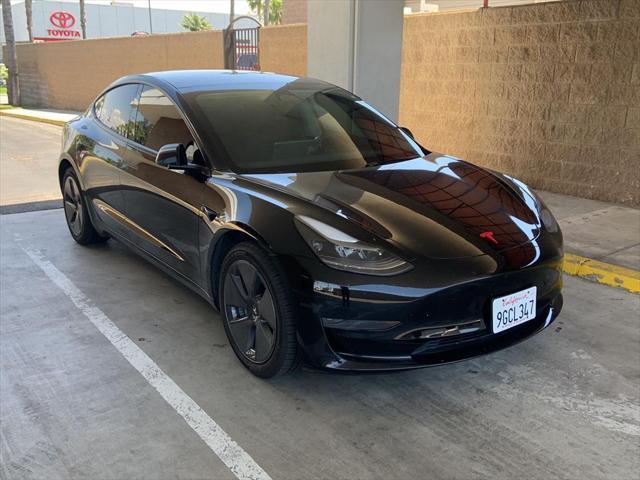 used 2023 Tesla Model 3 car, priced at $27,886