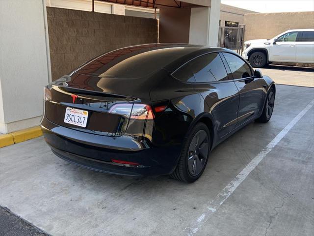 used 2023 Tesla Model 3 car, priced at $27,886