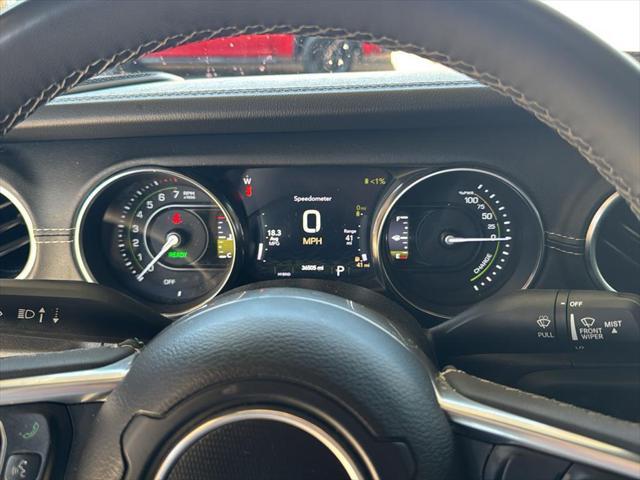 used 2023 Jeep Wrangler 4xe car, priced at $34,736