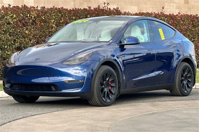 used 2024 Tesla Model Y car, priced at $38,552