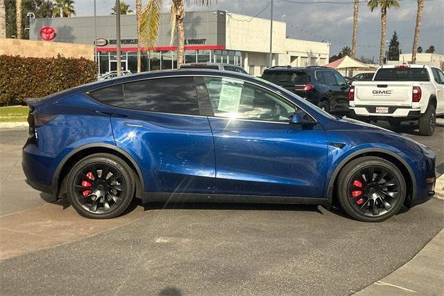 used 2024 Tesla Model Y car, priced at $38,552