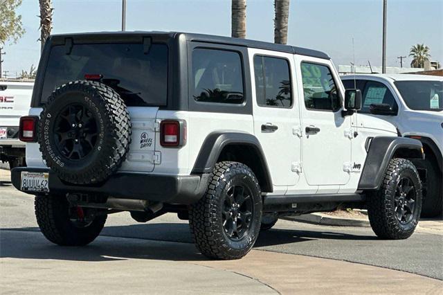 used 2021 Jeep Wrangler Unlimited car, priced at $34,190