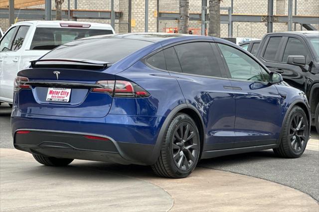 used 2022 Tesla Model X car, priced at $54,219