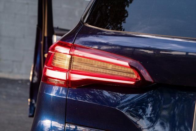 used 2021 BMW X5 M car, priced at $64,899