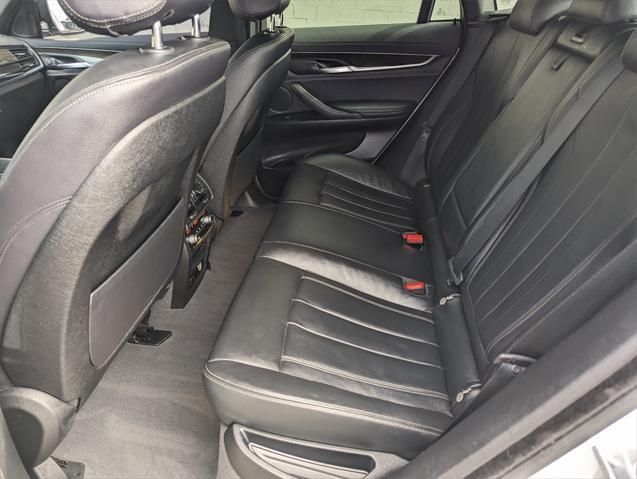 used 2018 BMW X6 car, priced at $29,499