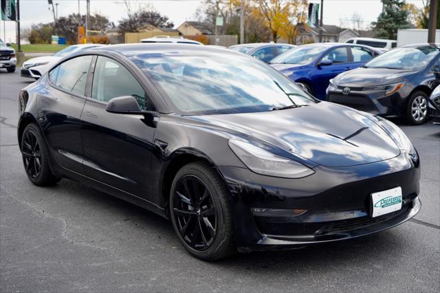 used 2022 Tesla Model 3 car, priced at $27,353