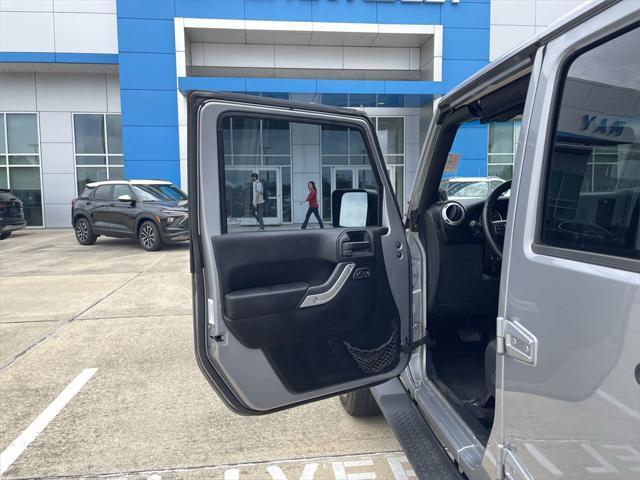 used 2014 Jeep Wrangler Unlimited car, priced at $17,990