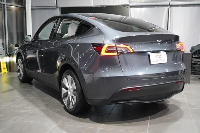 used 2023 Tesla Model Y car, priced at $31,885