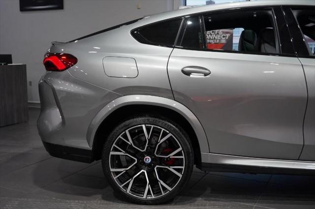 used 2022 BMW X6 M car, priced at $75,075